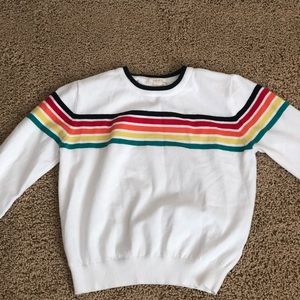 White sweater with colorful stripes